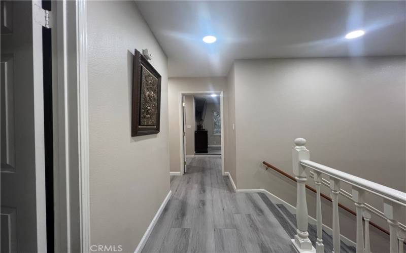 upstairs landing area looking at Master from 1st bedroom on right