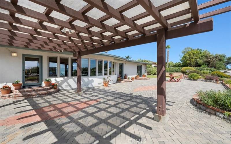 Outdoor patio with pergola, landscaping, pavers, BBQ, and views of the ocean and Catalina.