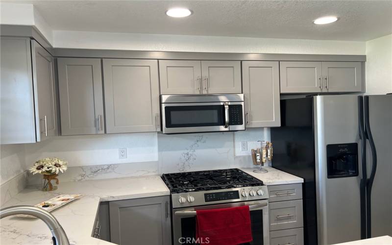 Remodeled kitchen with lots of cabinets