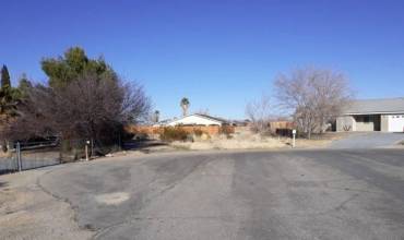 Front view of subject lot, surrounded by Single Family Residences