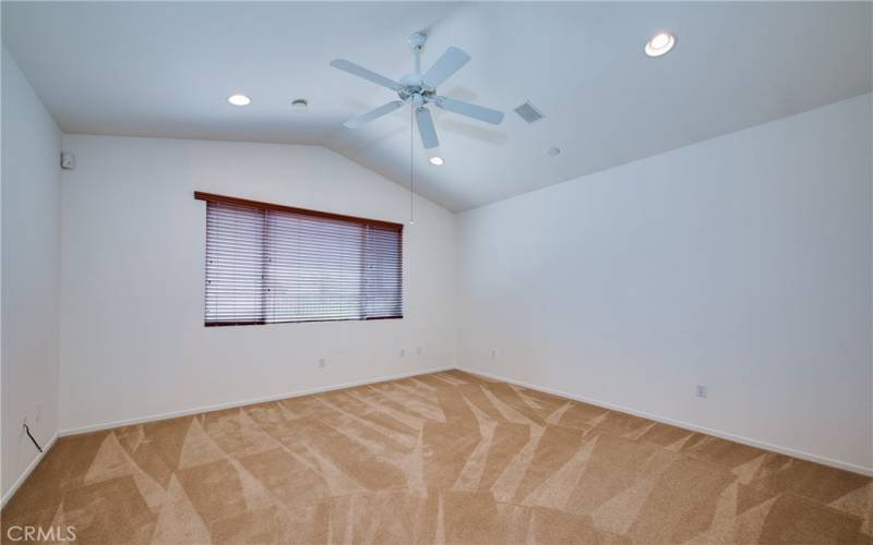 Elegant view master bedroom with ceiling fan.