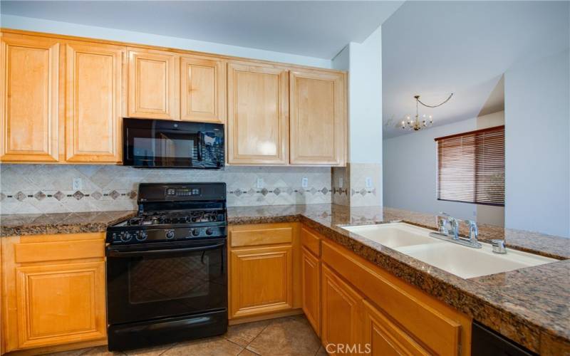 Cabinets galore and custom tile backsplashes.