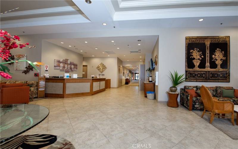 Lobby looking towards the media./card room, fitness center, multi-purpose rooms, library, computer center and billiard parlor.