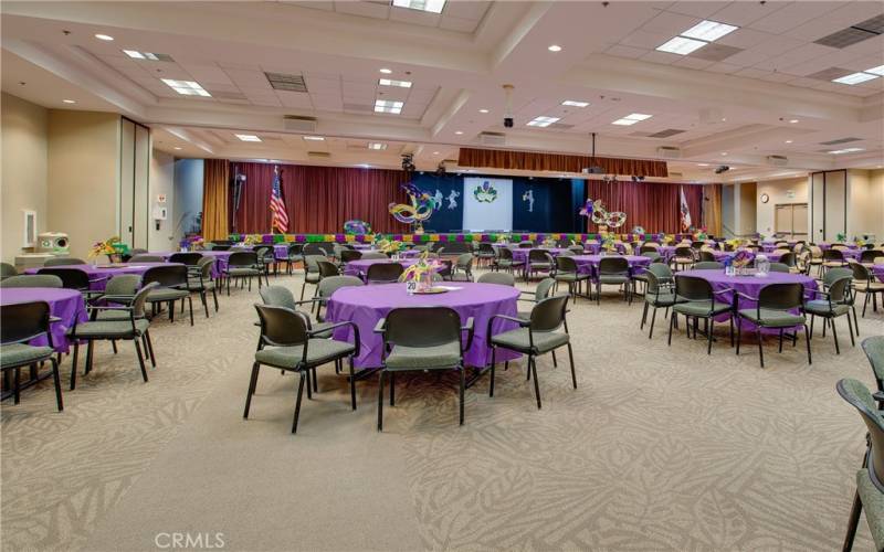 Huge auditorium with dance floors, indoor and outdoor stages, commercial kitchen and restrooms.