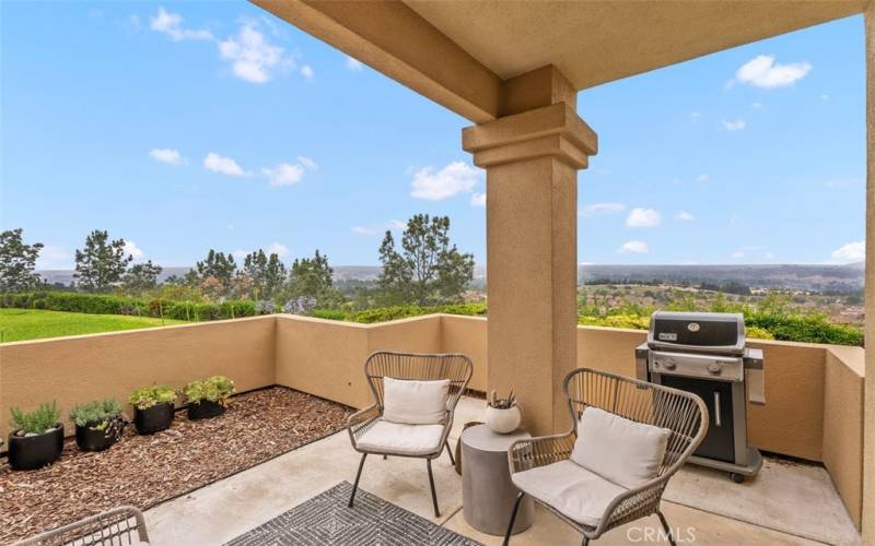 Stunning unobstructed mountain, golf course and city light views to enjoy from inside and out on the large patio