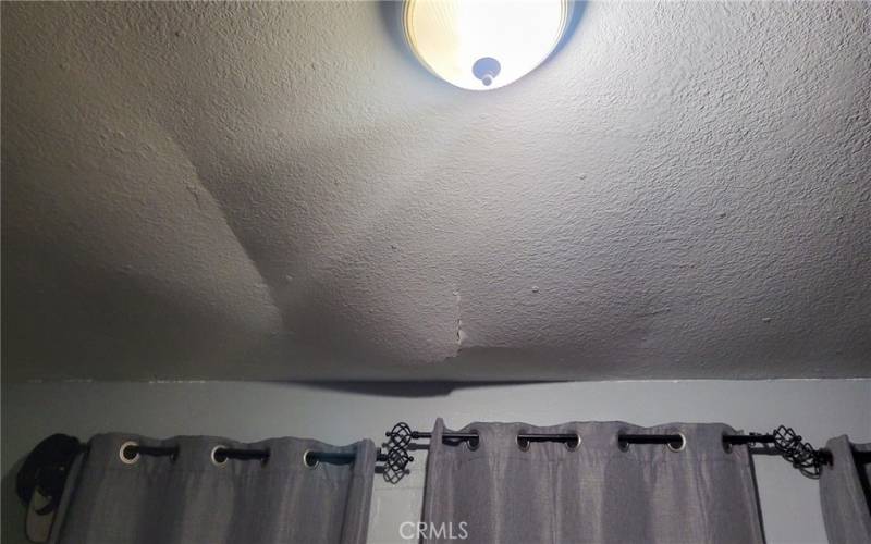 Ceiling damage in second bedroom