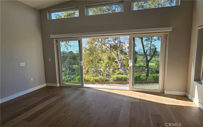 Primary bedroom leads to outdoor patio.