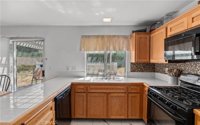 Kitchen with window looking out to yard