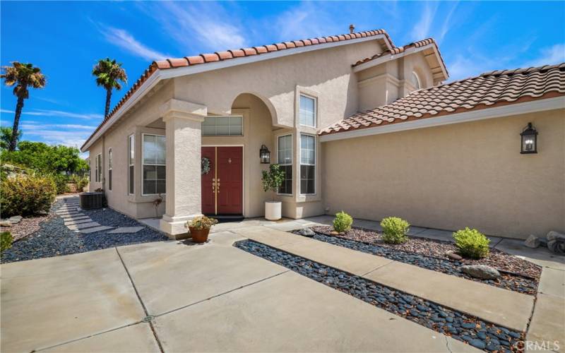 Your large entry courtyard brings you to the double doors.