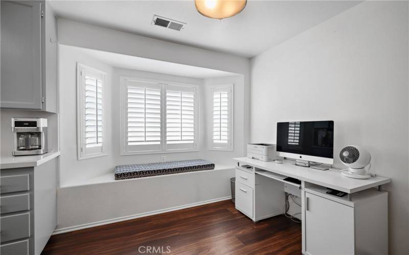 Look at the inviting window seat and shutters.