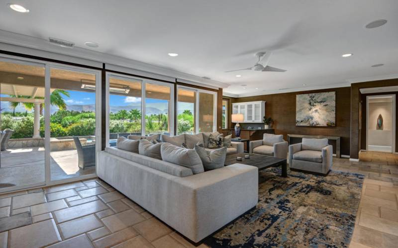 LIVING ROOM TO POOL AND MOUNTAINS