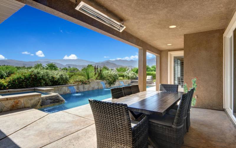 BACK COVERED PATIO TO POOL AND MOUNTAINS