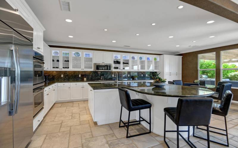 BREAKFAST BAR TO KITCHEN AND DINING