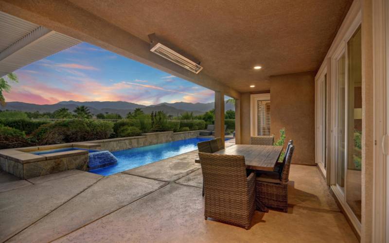 BACK COVERED DINING PATIO TO POOL NIGHT