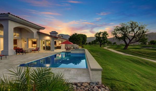 ACROSS POOL TO WESTERN MOUNTAINS NIGHT M