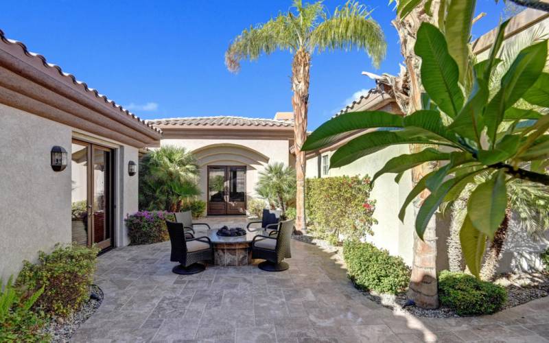 006ENTRY COURTYARD WITH LUSH PLUMERIA