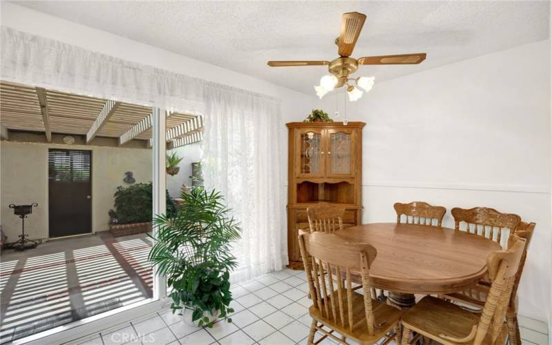 Dining area looks out to patio