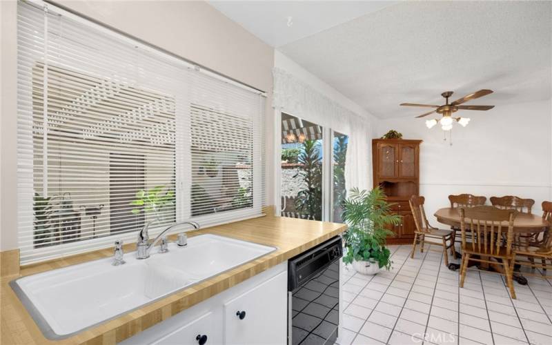 Kitchen looks out to patio area