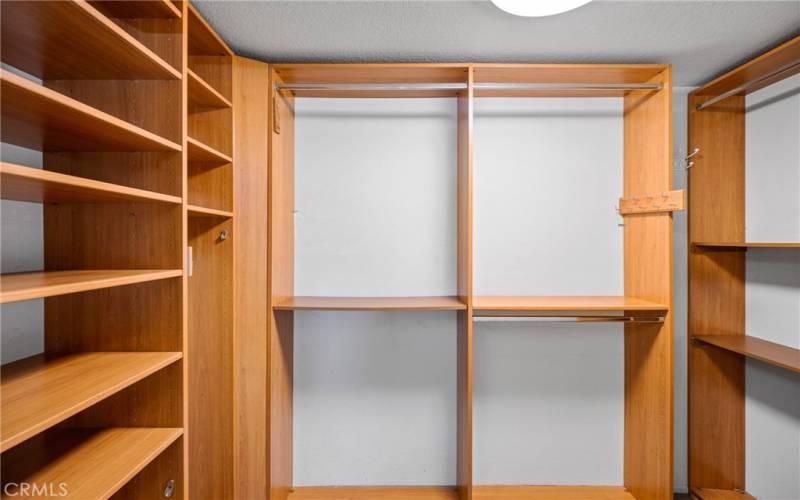 a touch of luxury, with a fully-upgraded primary walk-in closet organization system