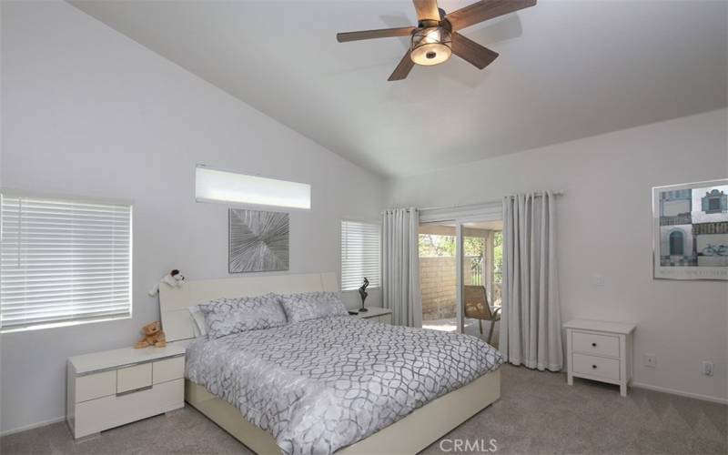 Main bedroom with view to the backyard patio