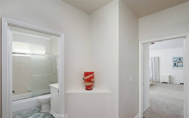 View to the hallway bathroom and main bedroom