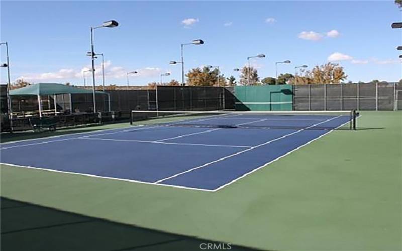 4 lighted tennis courts with Grand Stands