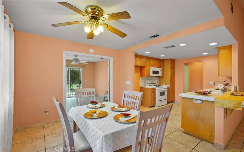 DINING AREA, KITCHEN, AND FAMILY ROOM/DEN