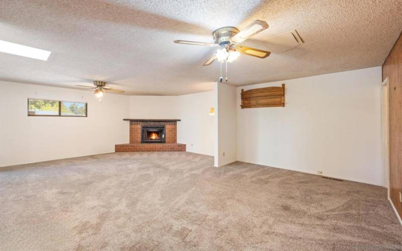 Family room was a room addition (permitted).  Fireplace is wood burning.