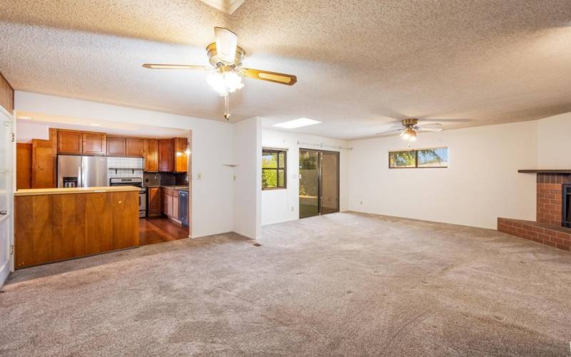 The family room, possible dining area and kitchen have a great room feel.  Very open and inviting with a sliding door to the backyard.