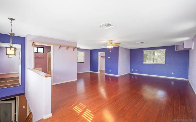 Upstairs room addition with wood floors