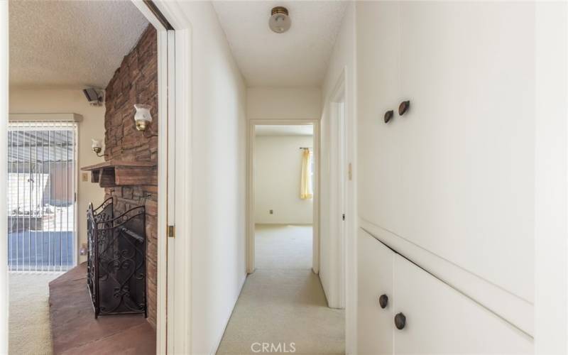 Rear hallway looking at rear bed room and rear bath room on right