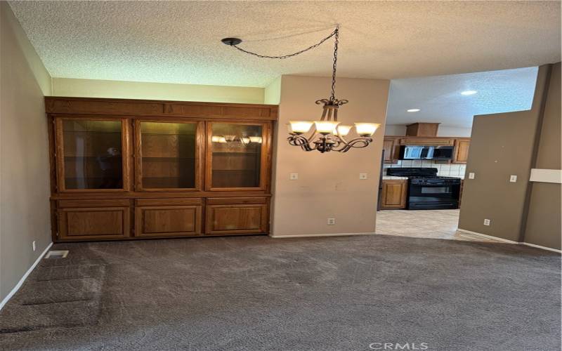 Formal Dining Area features built in cabinetry