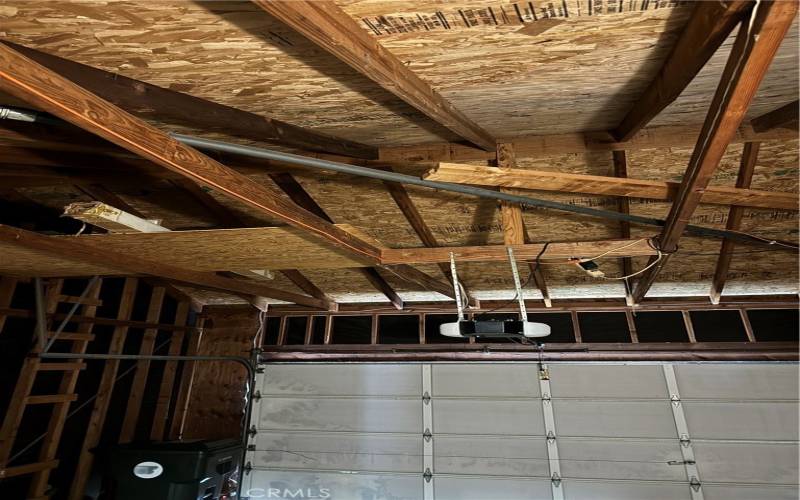 Ample storage in attached Garage rafter area