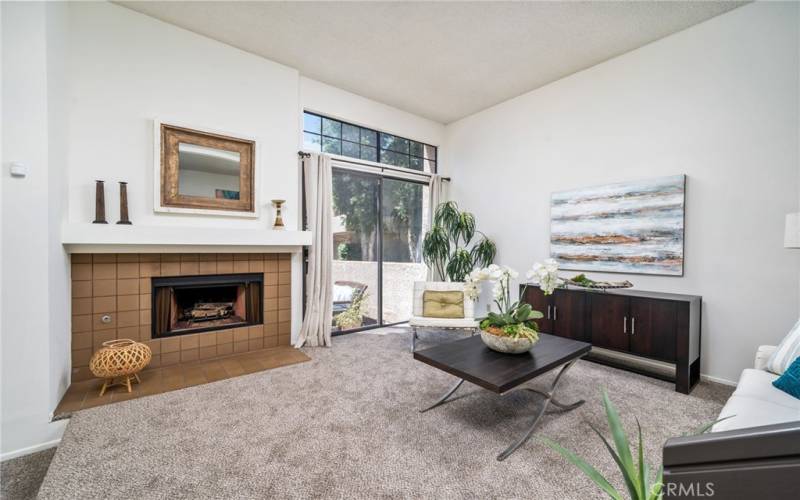 Living room with high ceilings and ample natural light