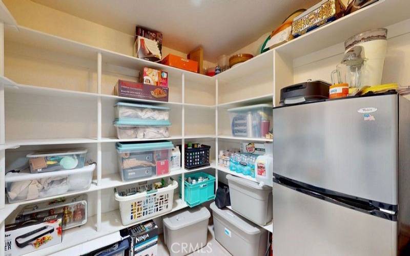 Oversized secondary pantry in laundry room