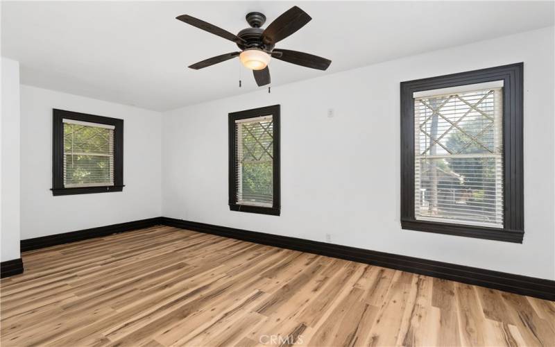 This spacious bedroom faces the front of the home.