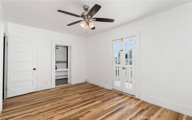 This view shows the door to the hallway, and the bathroom access.