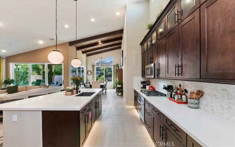 Glass Insets in Cabinetry with Lighting Inside - So many NICE Touches throughout home - Baseboard Lighting as well