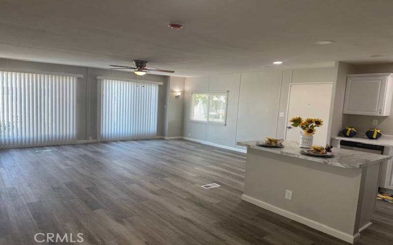 Living room from dining room and part of the kitchen.