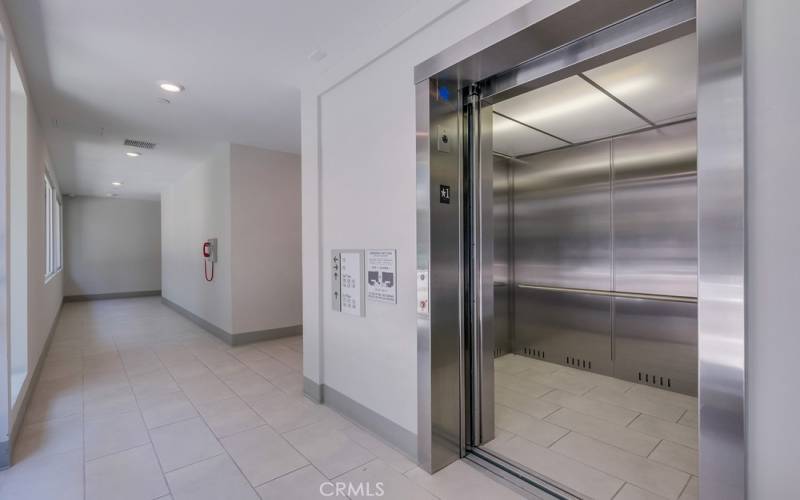 Elevator in building, ground level common area