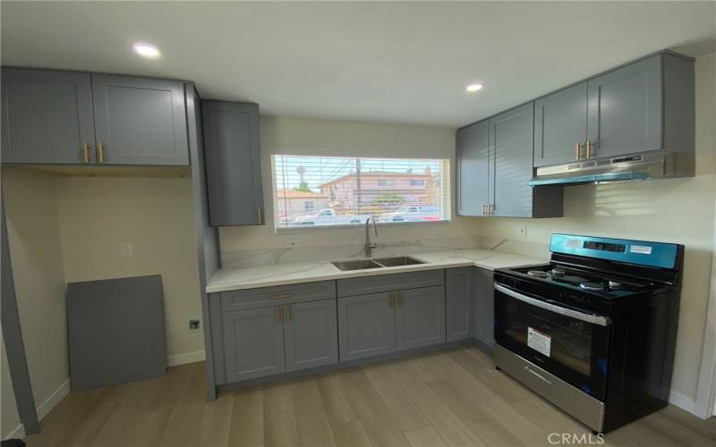 Front Unit Kitchen. New Cabinets with New Corian Counters. New Stove