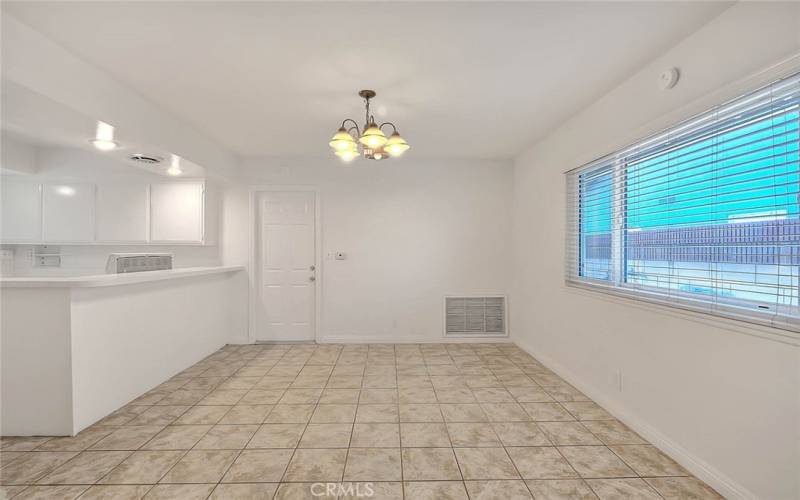 Dining area with tile flooring