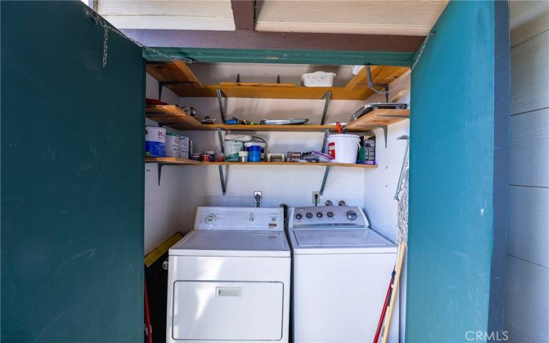 Washer and dryer area of patio.