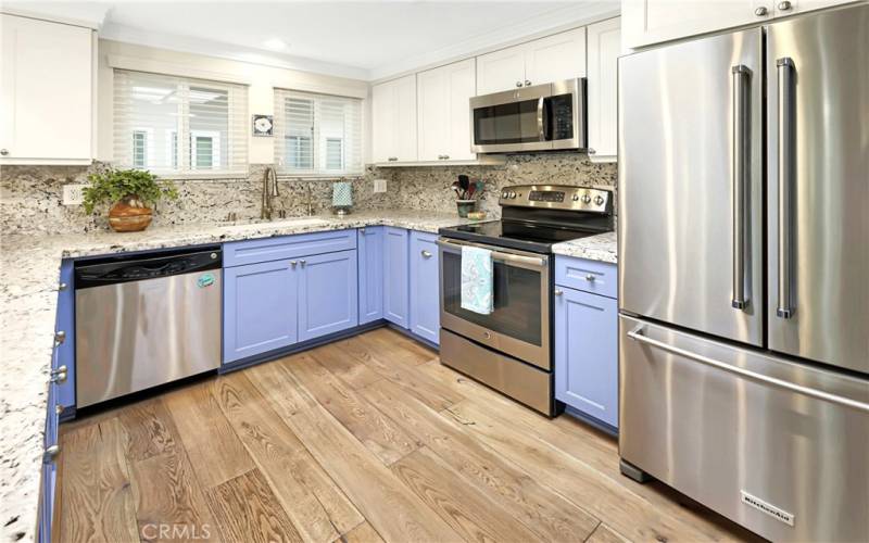 Stainless steel appliances (refrigerator replaced in 2024) and reverse osmosis water system with a dedicated faucet and line to the refrigerator