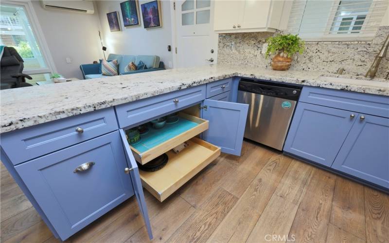 Pull out drawers in cabinet