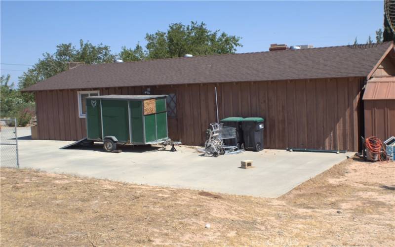 RV parking area next to garage