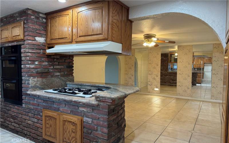 Kitchen, cooktop and double ovens.