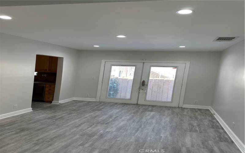 Formal Dining Room with French Doors & Recessed Can Lighting