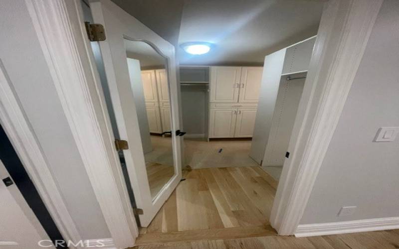 Entry To Walk-In Closet with Full Length Mirror