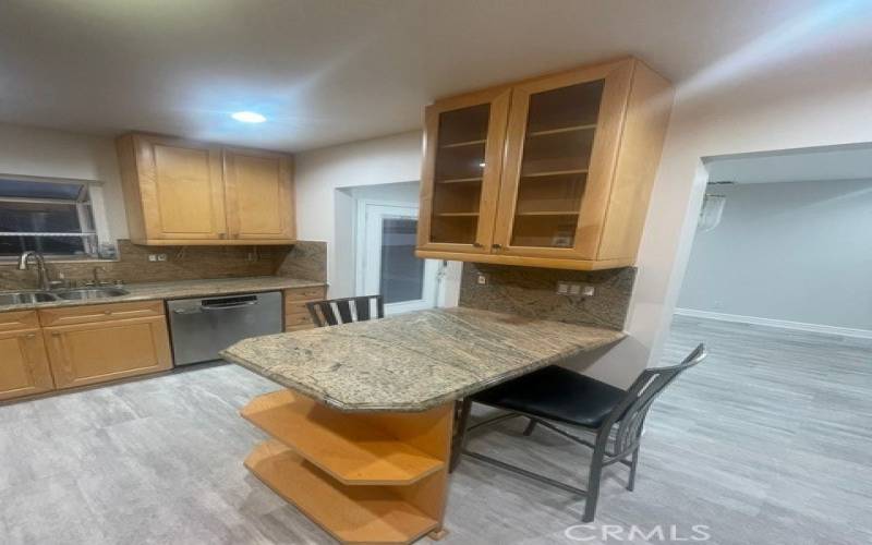 Breakfast Bar With Display Shelves and Cabinets